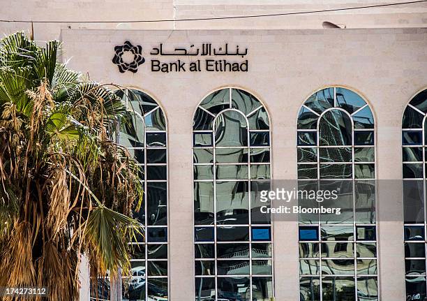 The logo of Bank al Etihad sits on display outside their headquarters in the financial district in Amman, Jordan, on Sunday, July 21, 2013. Jordanian...