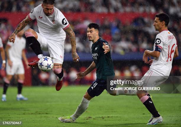 Sevilla's Spanish defender Sergio Ramos controls the ball in front of Arsenal's Brazilian midfielder Gabriel Martinelli and Sevilla's Spanish...