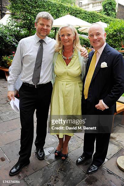 Adrian Chiles, Dogs Trust CEO Clarissa Baldwin and Dogs Trust Chairman Philip Daubeny attend the Dogs Trust Honours held at Home House on July 23,...
