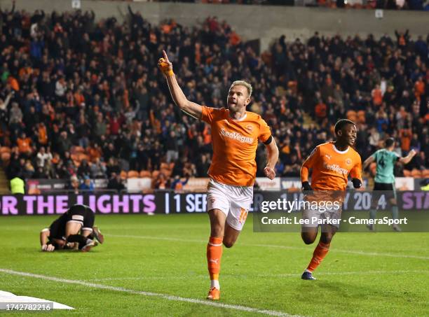 Blackpool's Jordan Rhodes celebrates scoring his side's second goal with Karamoko Dembele during the Sky Bet League One match between Blackpool and...