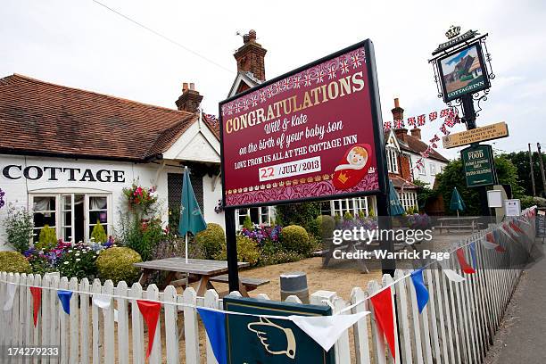 Congratulatory sign for the Duke and Duchess of Cambridge, celebrating the birth of their son is seen outside the "Cottage Inn" pub in the Duchess of...