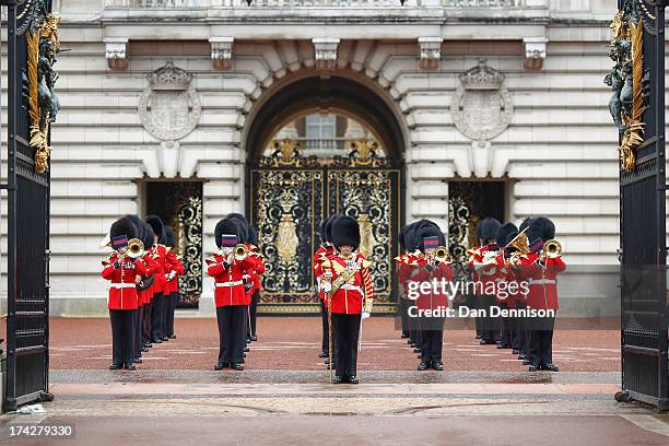 The Changing of the guard band play "Congratulations" the day after the birth of the son of Prince William, Duke of Cambridge and Catherine, Duchess...