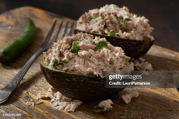 avocado tuna salad boats - stuffed avocado stock pictures, royalty-free photos & images