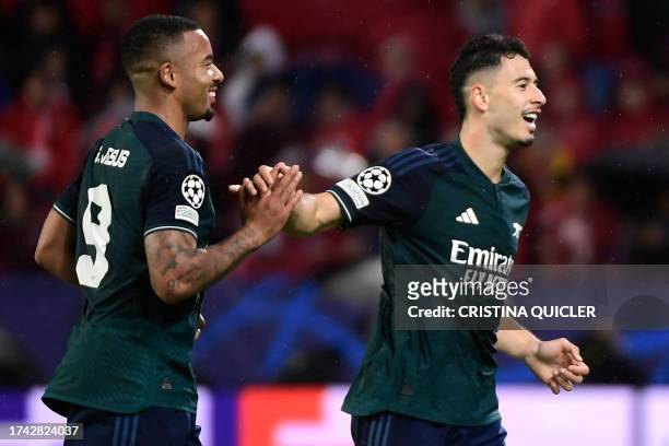 Arsenal's Brazilian midfielder Gabriel Martinelli celebrates scoring the opening goal with Arsenal's Brazilian forward Gabriel Jesus during the UEFA...