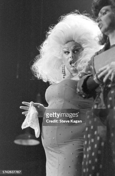 View of American actor and drag performer Divine on stage during a performance of the play 'The Neon Woman' at the Park West Theater, Chicago,...