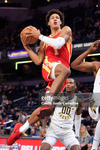 Jalen Johnson of the Atlanta Hawks drives to the basket in the game against the Indiana Pacers at Gainbridge Fieldhouse on October 16, 2023 in...