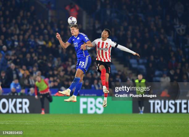 Jannik Vestergaard of Leicester City with Mason Burstow of Sunderland during the Sky Bet Championship match between Leicester City and Sunderland at...