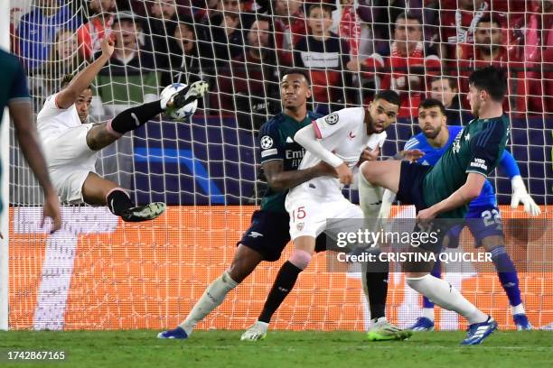 Sevilla's Dominican forward Mariano Diaz kicks the ball during the UEFA Champions League 1st round day 3 Group B football match between Sevilla FC...