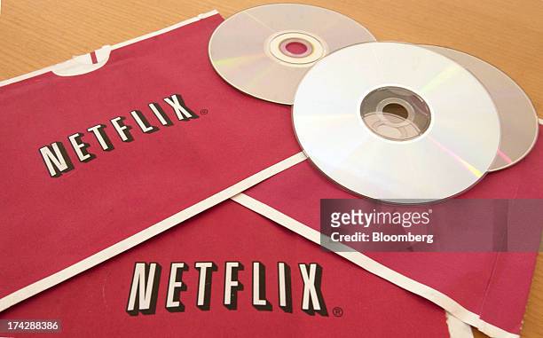 S sit on top of Netflix Inc. Envelopes arranged for a photograph in the Queens borough of New York, U.S, on Friday, Nov. 7, 2003. Netflix Inc. Shares...
