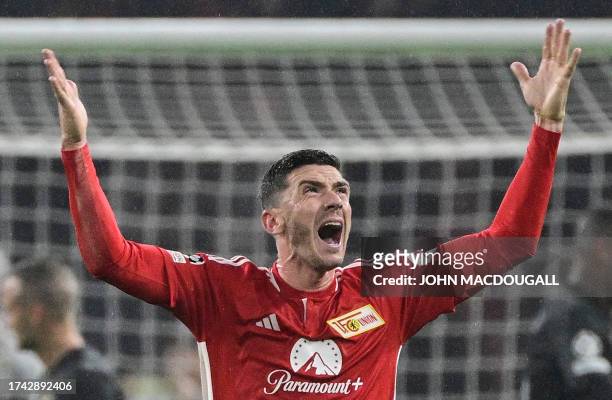 Union Berlin's German defender Robin Gosens reacts after a missed chance on goal during the UEFA Champions League group C football match 1 FC Union...