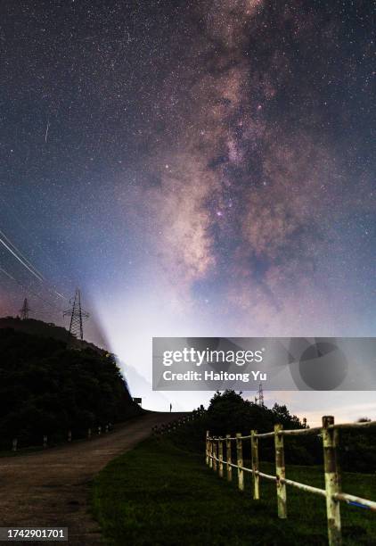 milky way above mountain fog at night - luoding stock pictures, royalty-free photos & images