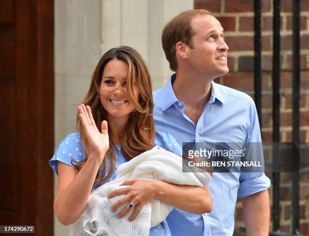 Prince William and Catherine, Duchess of Cambridge show their new-born baby boy to the world's media, on the steps outside the Lindo Wing of St...