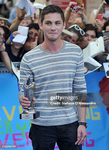 Logan Lerman attends 2013 Giffoni Film Festival bllue carpet on July 23, 2013 in Giffoni Valle Piana, Italy.