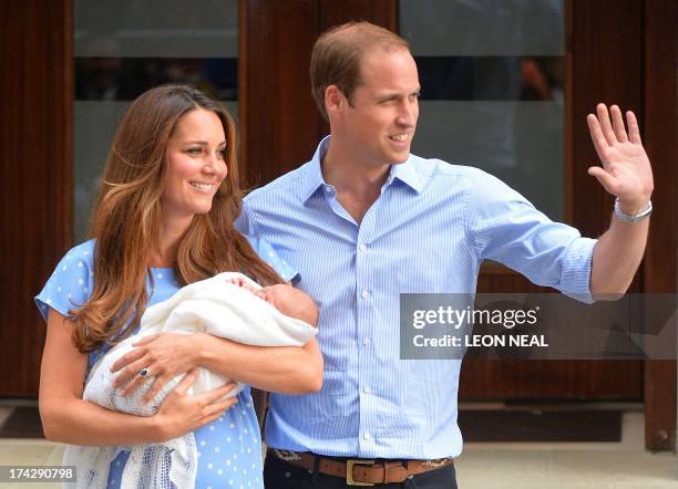 Prince William and Catherine, Duchess of Cambridge show their new-born baby boy to the world's media outside the Lindo Wing of St Mary's Hospital in...