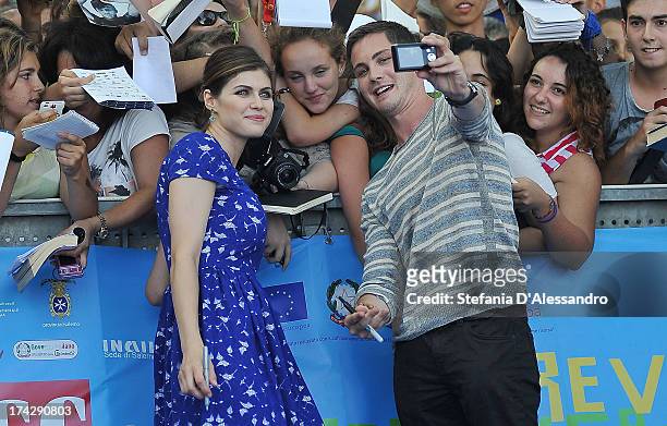 Alexandra Daddario and Logan Lerman attend 2013 Giffoni Film Festival blue carpet on July 23, 2013 in Giffoni Valle Piana, Italy.