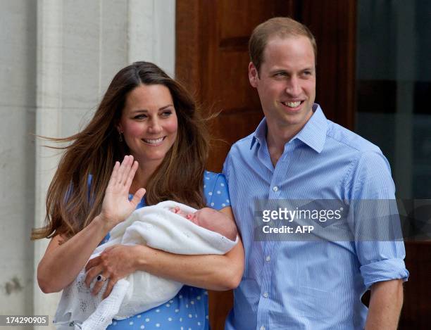 Prince William and Catherine, Duchess of Cambridge show their new-born baby boy to the world's media, standing on the steps outside the Lindo Wing of...