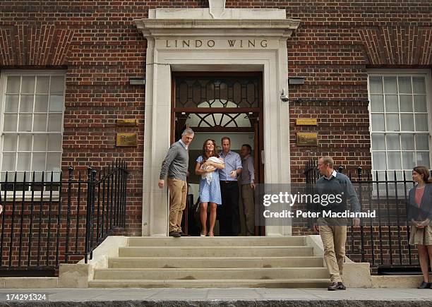 Prince William, Duke of Cambridge and Catherine, Duchess of Cambridge, depart The Lindo Wing with their newborn son at St Mary's Hospital on July 23,...