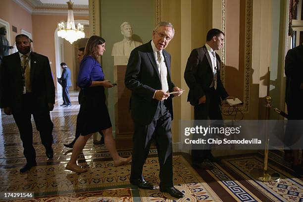 Senate Majority Leader Harry Reid arrives for a news conference in the Ohio Clock Corridor at the U.S. Capitol July 23, 2013 in Washington, DC. Reid...