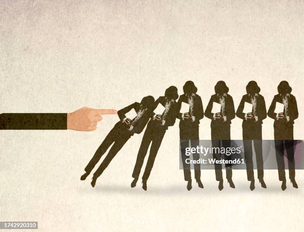 illustration of oversized hand toppling line of businesswomen - diskriminierung stock-grafiken, -clipart, -cartoons und -symbole