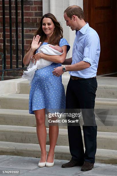 Prince William, Duke of Cambridge and Catherine, Duchess of Cambridge leave the Lindo Wing of St Mary's Hospital with their newborn son on July 23,...