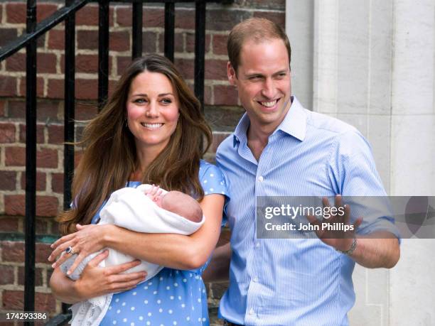 Prince William, Duke of Cambridge and Catherine, Duchess of Cambridge with their newborn son depart the Lindo Wing of St Mary's Hospital on July 23,...