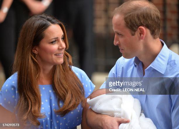 Prince William and Catherine, Duchess of Cambridge show their new-born baby boy to the world's media outside the Lindo Wing of St Mary's Hospital in...