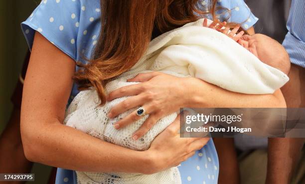Catherine, Duchess of Cambridge departs The Lindo Wing with her newborn son at St Mary's Hospital on July 23, 2013 in London, England. The Duchess of...