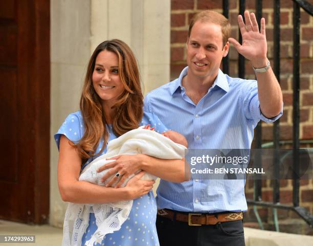 Prince William and Catherine, Duchess of Cambridge show their new-born baby boy to the world's media, standing on the steps outside the Lindo Wing of...