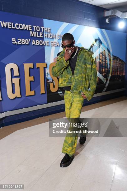 Justin Holiday of the Denver Nuggets arrives to the arena before the game against the Los Angeles Lakers on October 24, 2023 at the Ball Arena in...
