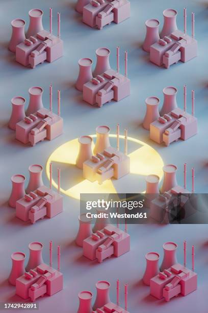 3d render of rows of nuclear power plant models standing against gray background with radioactive warning symbol in center - industrial building stock illustrations