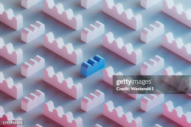 3d pattern of pink wavy toy blocks with single blue one in center - alone in a crowd stock illustrations