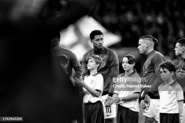 Jude Bellingham of England lines up for the national anthem during the UEFA EURO 2024 European qualifier match between England and Italy at Wembley...