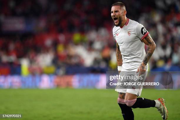 Sevilla's Serbian midfielder Nemanja Gudelj celebrates scoring his goalduring the UEFA Champions League 1st round day 3 Group B football match...