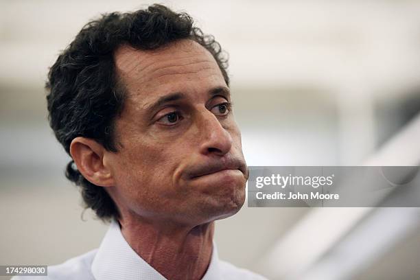 Anthony Weiner, a leading candidate for New York City mayor, stands with his wife Huma Abedin during a press conference on July 23, 2013 in New York...