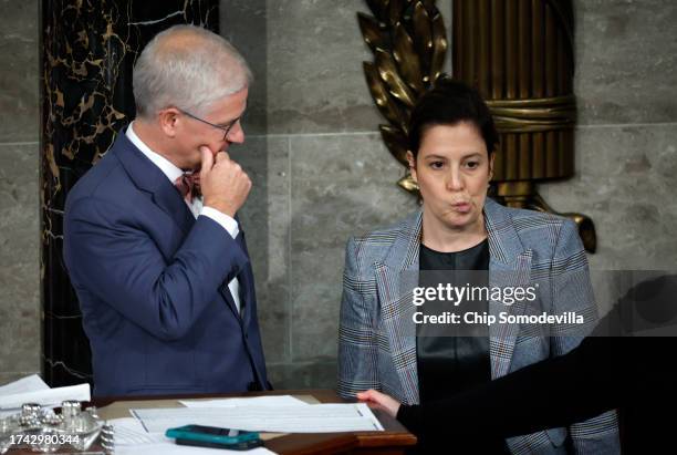 Speaker Pro Tempore Rep. Patrick McHenry talks to Rep. Elise Stefanik after the House of Representatives failed to elect a new Speaker of the House...