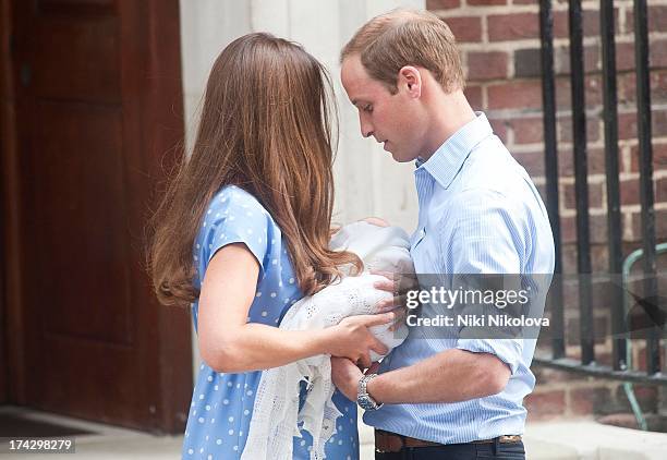 Catherine, Duchess of Cambridge and Prince William, Duke of Cambridge depart The Lindo Wing with their newborn son at St Mary's Hospital on July 22,...