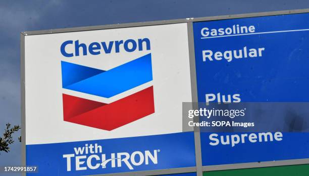 Sign at a Chevron gas station is seen in Orlando. Chevron Corp announced that it has agreed to buy Hess Corporation for $53 billion in stock.