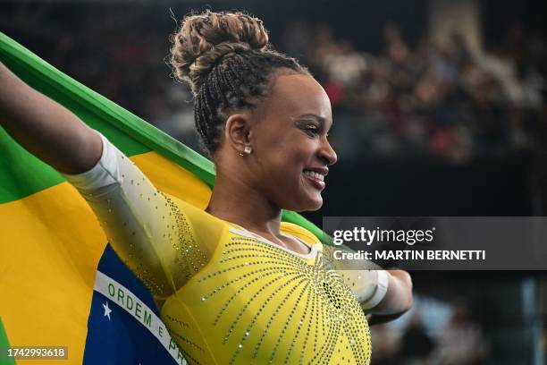 Brazil's Rebeca Andrade celebrates after winning the gold medal in the artistic gymnastics women's vault final during the Pan American Games Santiago...