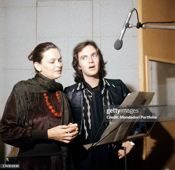 The Italian actress Lucia Bosè, artistic name of Lucia Borloni, in a recording studio with her son, the half Italian and Spanish singer Miguel Bosè,...