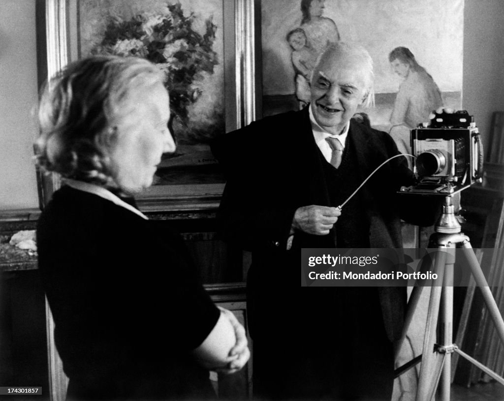 Carlo Carrà Taking A Picture Of His Wife Ines Minoja