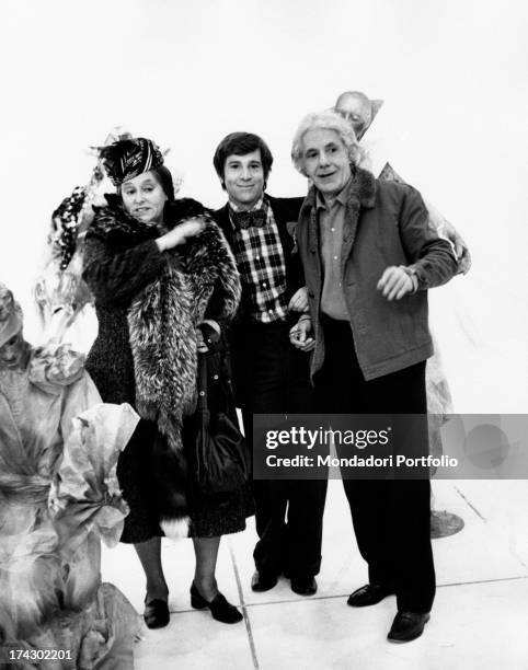 Italian actor Enzo Cerusico hugs Italian actress and host Ave Ninchi and Italian actor Gianrico Tedeschi during the tv show Il gran simpatico. Milan...