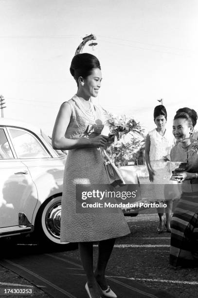 The Queen of Thailand Sirikit meets some Thai women. Bangkok, 1965.