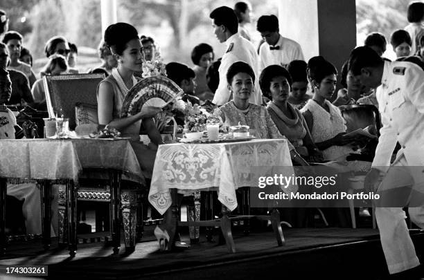 Thai young women performing a traditional dance. Bangkok, 1965.