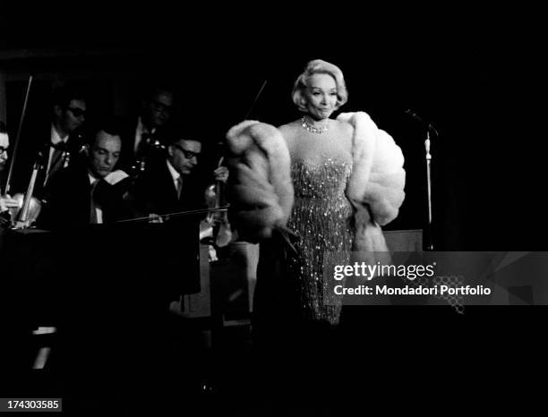 The German singer and actress Marlene Dietrich during her musical show at the Bussola, a fashion Versilia night club. Viareggio , 1972..