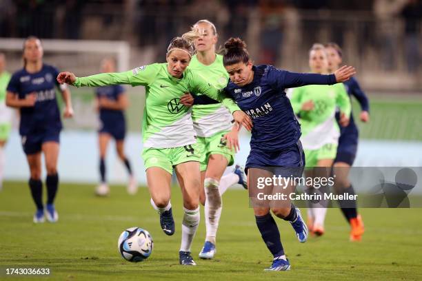 Kathrin Hendrich of VfL Wolfsburg tackles Mathilde Bourdieu of Paris FC during the UEFA Women's Champions League Qualifying Round 2 Second Leg match...