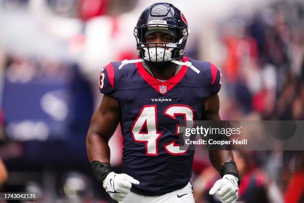 Neville Hewitt of the Houston Texans runs out of the tunnel prior to an NFL football game against the New Orleans Saints at NRG Stadium on October...