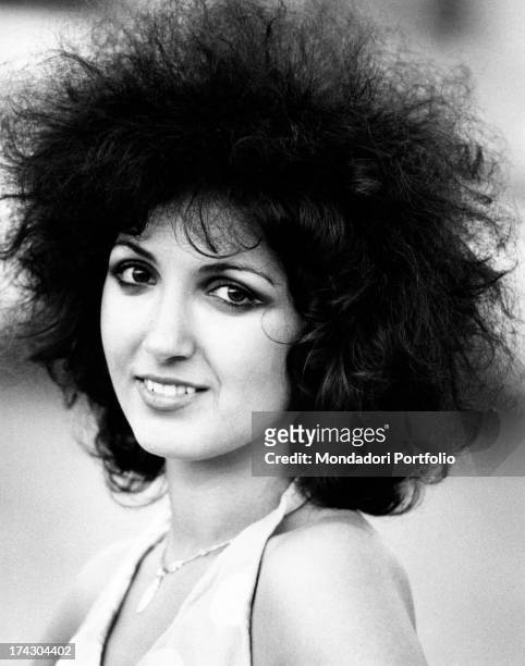 Close-up of the Italian singer Marcella Bella, famous for her voice and for her curly and thick black hair; in these years she is definitely...