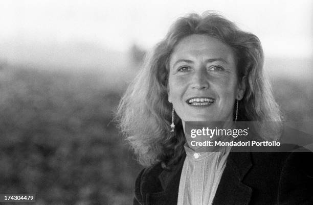 Italian writer and journalist Barbara Alberti smiling. 1970s.