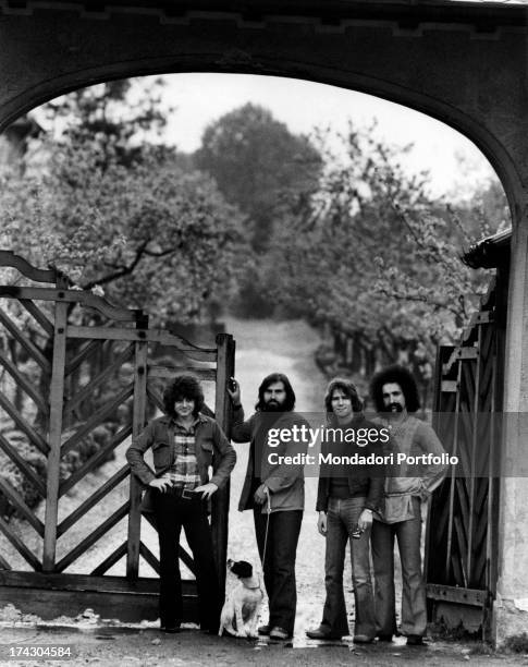 The Italian music band I Camaleonti in front of a wooden gate in the province of Milan: from left Antonio Cripezzi known as Tonino , Paolo de Ceglie...