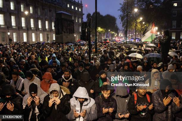 Vigil for the victims of the Al-Ahli Arab Hospital explosion is held opposite Downing Street on October 18, 2023 in London, England. Authorities in...